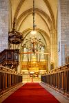 Un'immagine dell'interno della famosa cattedrale di Visby, conosciuta come Sankta Maria Domkyrka, costruita tra il XII e il XIII secolo con i soldi dei mercanti tedeschi - Foto © ...