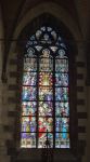 Una vetrata della collegiata Saint-Ursmer a Binche, Belgio. La storia di questa cattedrale ha inizio nel XII° secolo. Sorge a sud di Grand' Place ed è stata quasi tutta restaurata ...